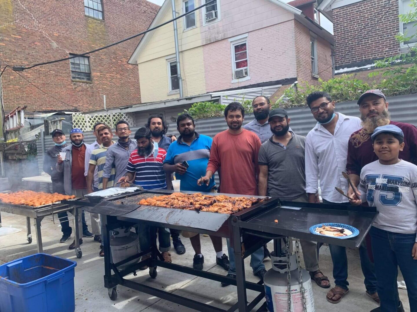 A community of Muslims having a cookout